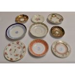 A collection of assorted Crown Derby and Royal Crown Derby saucers, mostly 19th Century, hand