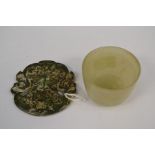 A Chinese Bi Moss Jade carved Pendant approx 70mm and a small 47mm in height Jade bowl, width