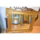 Modern rectangular mirror with gilt-coloured frame, size 107 x 94cm.