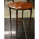 A small mahogany drop leaf table