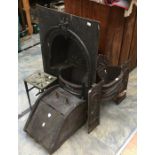 19th Century cast iron fire place with Royal Coat of Arms trivets and coal, plus a fire back