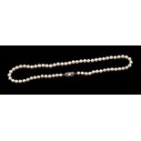 Mikimoto- A Mikimoto cultured pearl necklace, comprising uniform pearls, pink overtone, each