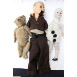 A collection of various toys to include a puppet, clown doll and teddy bear