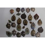 A collection of 12 Football and 10 enamel Ballroom Dancing Medals and one silver Gospel Oak &