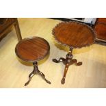 A 19th Century circular floral top mahogany wine table, turned column on a tripod form on claw feet;