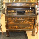 A 19th Century Chinoiserie lacquered bureau, rectangular top fitted three small drawers, above a