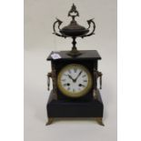 A late 19th Century black slate and marble eight day mantel clock
