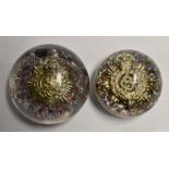 Two Ysart military paperweights. Largest paperweight  approx 8cm diameter, 6cm height. Small