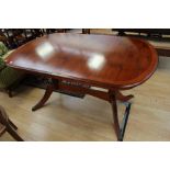 A 20th century mahogany drawleaf dining table