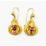 A pair of Victorian Etruscan revival earrings, comprising leaf and applied decoration, set with