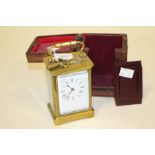 Edwardian brass carriage clock in case with key. Working.