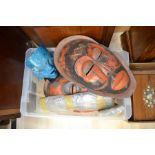 A collection of assorted African wall masks, of various sizes, styles and materials