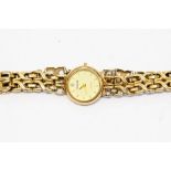 A ladies 9ct gold Accurist watch, cream tone dial baton markers, case diameter approx. 18mm, with