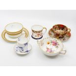 A collection of late 19th Century and early 20th Century Royal Crown Derby tea cups and saucers
