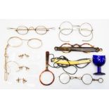 A small collection of spectacles, pince nez, lorgnettes and a monocle, including tortoiseshell