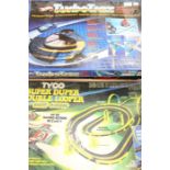 Tyco 'Super Duper Double Looper Racing' set as found, together with Hot Wheels Turbotrax set. (2)