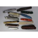 A collection of various items to include pen knives, propelling pencil, pipe tamper, etc, mother