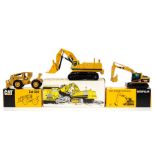 NZG: A boxed NZG, Caterpillar Excavator Front Shovel, 245; together with a boxed Caterpillar