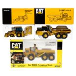 NZG: A boxed NZG, Caterpillar Articulated Truck, Series II, D250E; together with a boxed Caterpillar