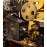 A Prestwich 35mm movie projector with beater movement and a W. Butcher & Sons No. 1 Maltese cross