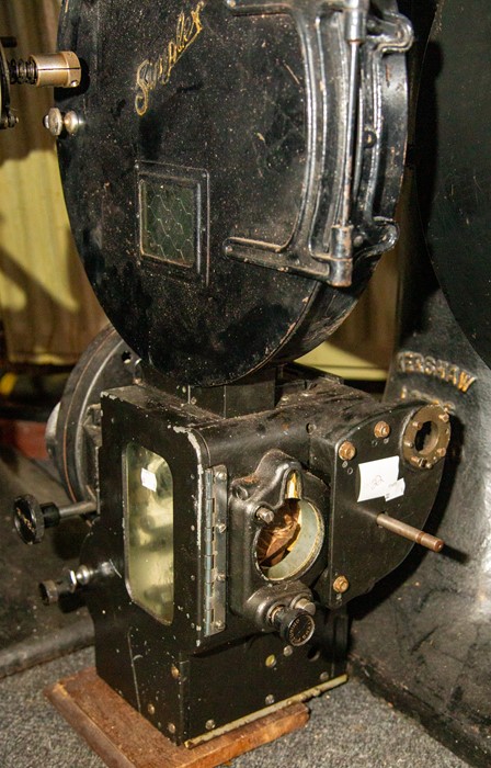 A Super Simplex 35mm movie projector mechanism with top box Please note: This Lot can only be viewed