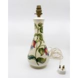 Moorcroft Fuchsia pattern table lamp on cream ground, approx 38 cms tall including fittings,