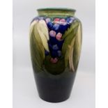 A large Moorcroft Leaf and Berry pattern tapered ovoid form vase, circa 1945/1946, impressed marks