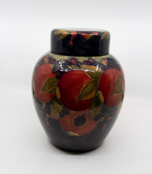 Moorcroft Pomegranate ginger jar, marked and signed in green to base, circa 1913-1916, approx 28 cms