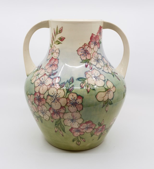 Moorcroft Spring Blossom pattern, two handled amphora form vase, signed and marked to base, circa