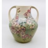 Moorcroft Spring Blossom pattern, two handled amphora form vase, signed and marked to base, circa