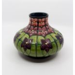 Moorcroft Violet pattern squat vase, circa 1998, signed and marked to base, approx 16 cms tall Few