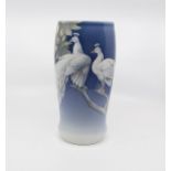 A large B & G Danish vase, 28 cms tall approx, decorated with white peacocks In good overall