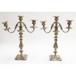 A pair of plated early 20th Century three branch candelabra's
