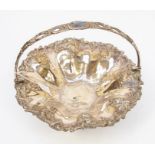 An early 20th Century silver plated fruit bowl, with handle and grape vine detail