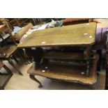 A 20th Century walnut and glass inlay coffee on carved cabriole legs; a similar oak coffee table (