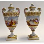 A pair of late 19th century Capodimonte moulded porcelain vases with covers. Each has a moulded