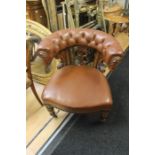 Victorian carved captain's chair, mahogany, re upholstered in brown button down leather Condition: