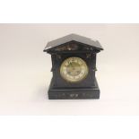 A Victorian black slate and marble inset eight day mantel clock, porcelain dial with Arabic