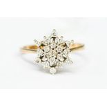 A 9ct gold and diamond cluster ring, floral claw setting,  size P, total gross weight approx 2.8gms