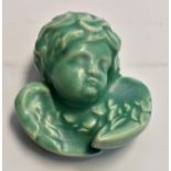 Carter and Co Poole of London Pottery wall hanging cherub/angel head in green, marked to back