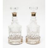 Pair of silver neck, cut glass decanters with stoppers, LONDON 1980, Israel Freeman & Son Ltd and
