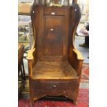 Yew wood early 18th Century shepherds chair, with drawer in seat and wing back  Condition: Once