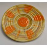 A Shelley Art Deco hand painted charger, circa 1935, with orange splash decoration on a yellow