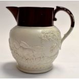 An early nineteenth century Davenport sprig moulded jug decorated with a hunting scene, circa