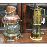A miners protector lamp, Eccles, early 20th Century, together with a further copper and brass anchor