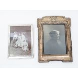 A silver photograph frame, plain, Birmingham 1920, wood back, approx 14.5cm x 10.5cm; another