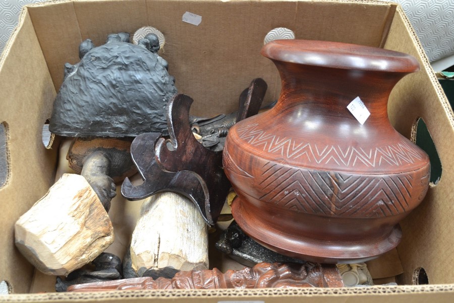 A collection of carved African figures including Chinese pots and other items