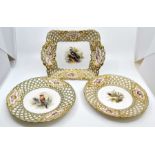 A pair of early 19th Century hand painted cabinet plates and a matching square shaped dish, each