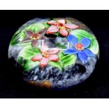 A mid 20th Century paperweight with floral design Condition: No obvious signs of damage or