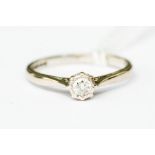 A diamond solitaire 18ct white ring, the illusion set brilliant cut diamond weighing approx. 0.15ct,